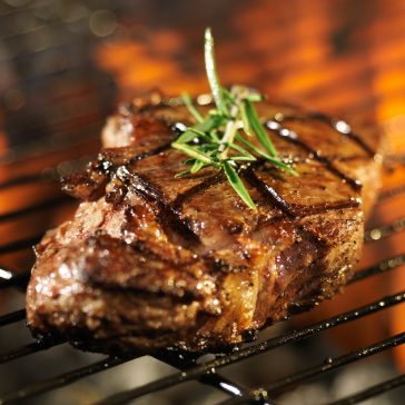 steak-cooking-over-flaming-grill-2023-11-27-04-52-38-utc-1.jpg